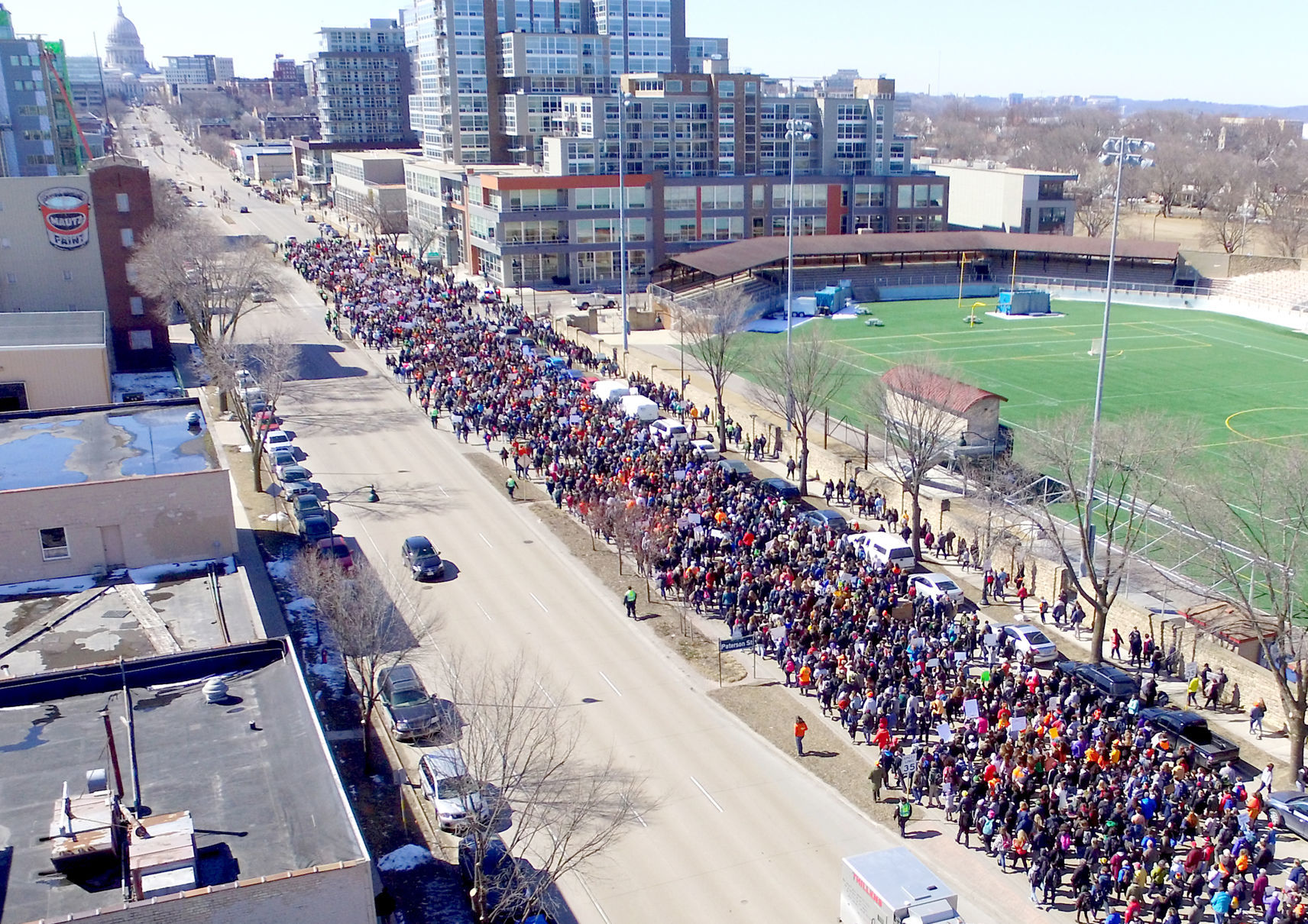 Student protesters fill eastbound lanes of East Washington Avenue